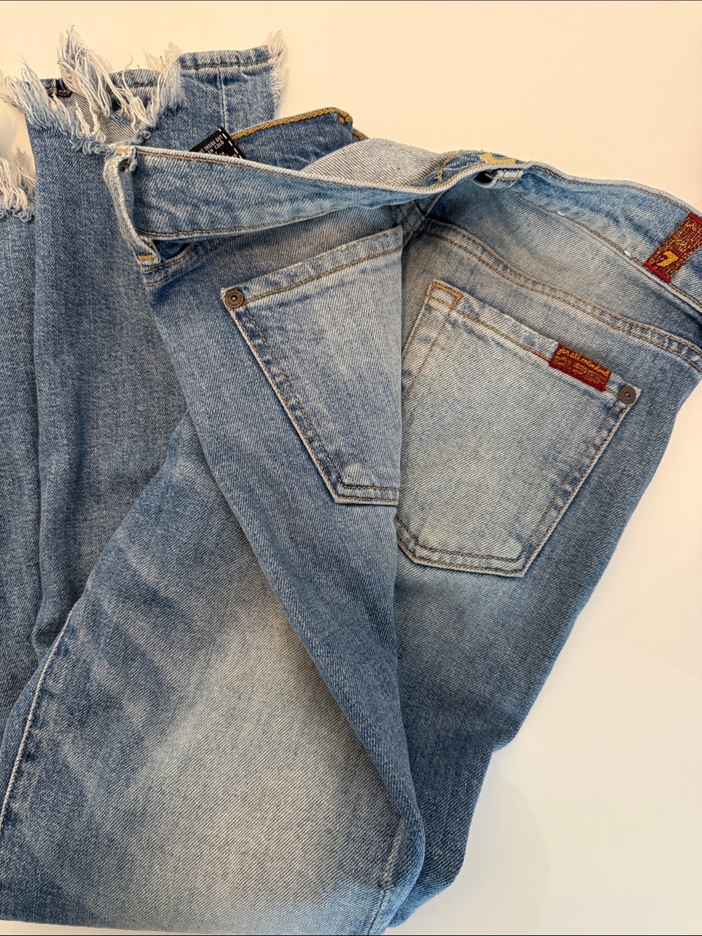 7 For All Mankind Light Blue Straight Leg Jeans with Frayed Hem